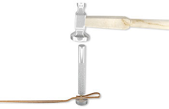 A hammer striking the rivet-setting tool
